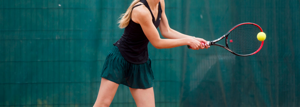 What Is Polyamide Fabric and How Is It Used? A women playing tennis.