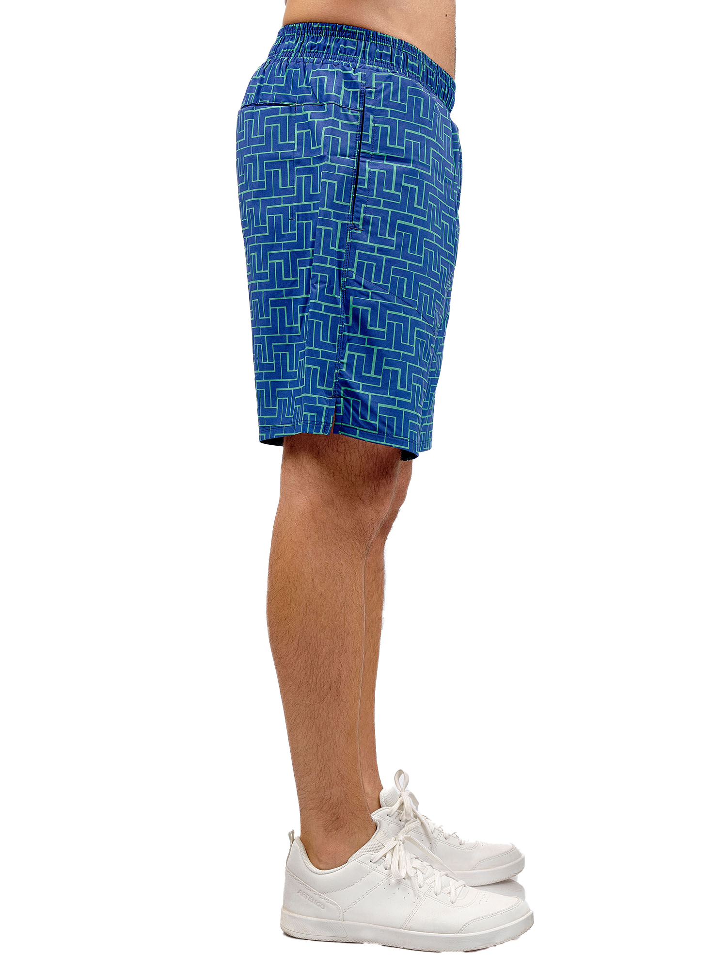 Man wearing Spin Short in Tessel Print, highlighting the athletic fit and multiple pockets.
