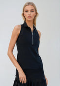 Front view | Woman wearing Neisha Classic Sleeveless Polo in black with silver zip and mesh shoulder inserts, demonstrating the semi-fitted design and ventilation features of this moisture-wicking golf shirt.