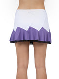 Back view of model wearing the Baseline butterfly skirt in white/lavender combo by inPhorm NYC