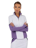 Front view of model wearing the Logan performance half zip jacket in white and lavender by inPhorm NYC with her hands crossed