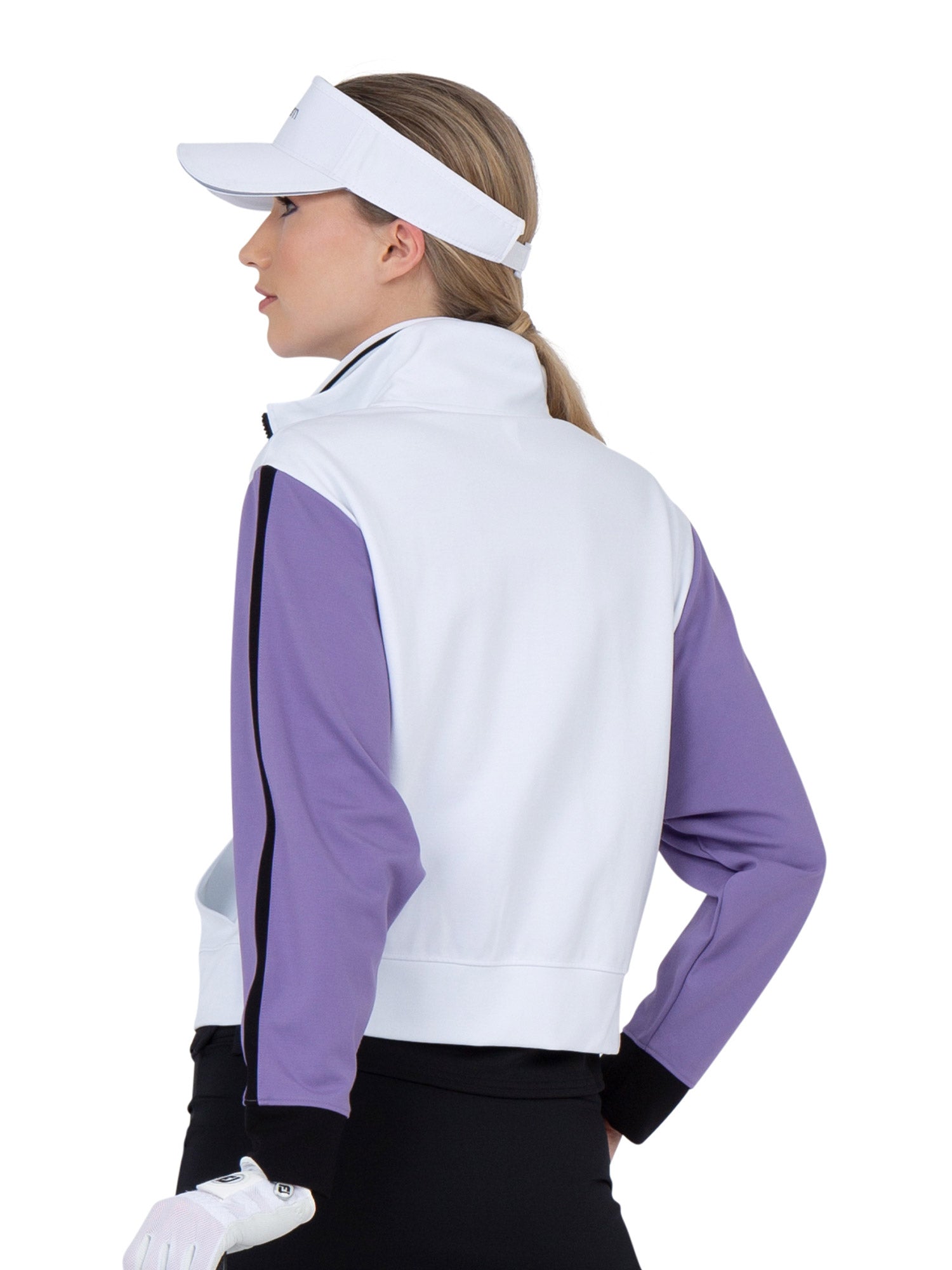 Back view of model wearing the Sofia knit jacket in white/lavender combo by inPhorm NYC wearing a white visor