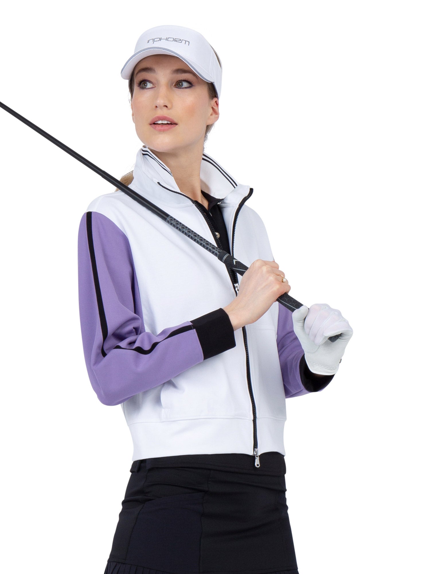 Front view of model wearing the Sofia knit jacket in white/lavender combo by inPhorm NYC with a golf club over her shoulder