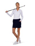 Front view of model wearing the Blake 17" golf skirt in ink by inPhorm NYC holding a golf club on her shoulder