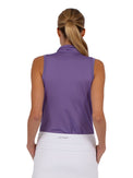 Back view of model wearing the Rhapsody quarter zip sleeveless top in lavender by inPhorm NYC with her hands in her pockets