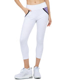 Front view of model wearing the Camilla athleisure capri in white/lavender combo by inPhorm NYC with her hand in her pocket