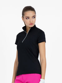 Front view of model wearing the zone short sleeve quarter zip top in black by inPhorm NYC with her hands at her side