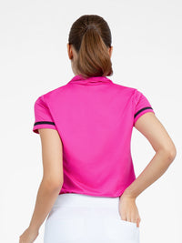 Back view of model wearing the zone short sleeve quarter zip top in pink by inPhorm NYC with one hand in her back pocket