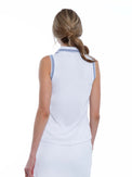 Back view of model wearing the Alexa performance sleeveless polo in white and granite by inPhorm NYC with her hands at her side