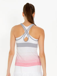 Back view of model wearing the Bailey criss cross back tank in plumeria ombre by inPhorm NYC with her hands at her side