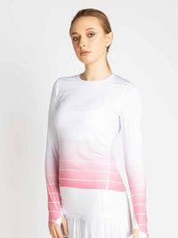 Front view of model wearing the Bailey long sleeve crew neck in plumeria ombre by inPhorm NYC with hands at her side