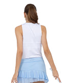 Back view of model wearing the Blaire tank in white by inPhorm NYC with her hands at her side