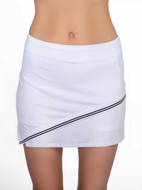 Front view of model wearing the Chloe 15" asymmetrical skirt in white and black by inPhorm NYC