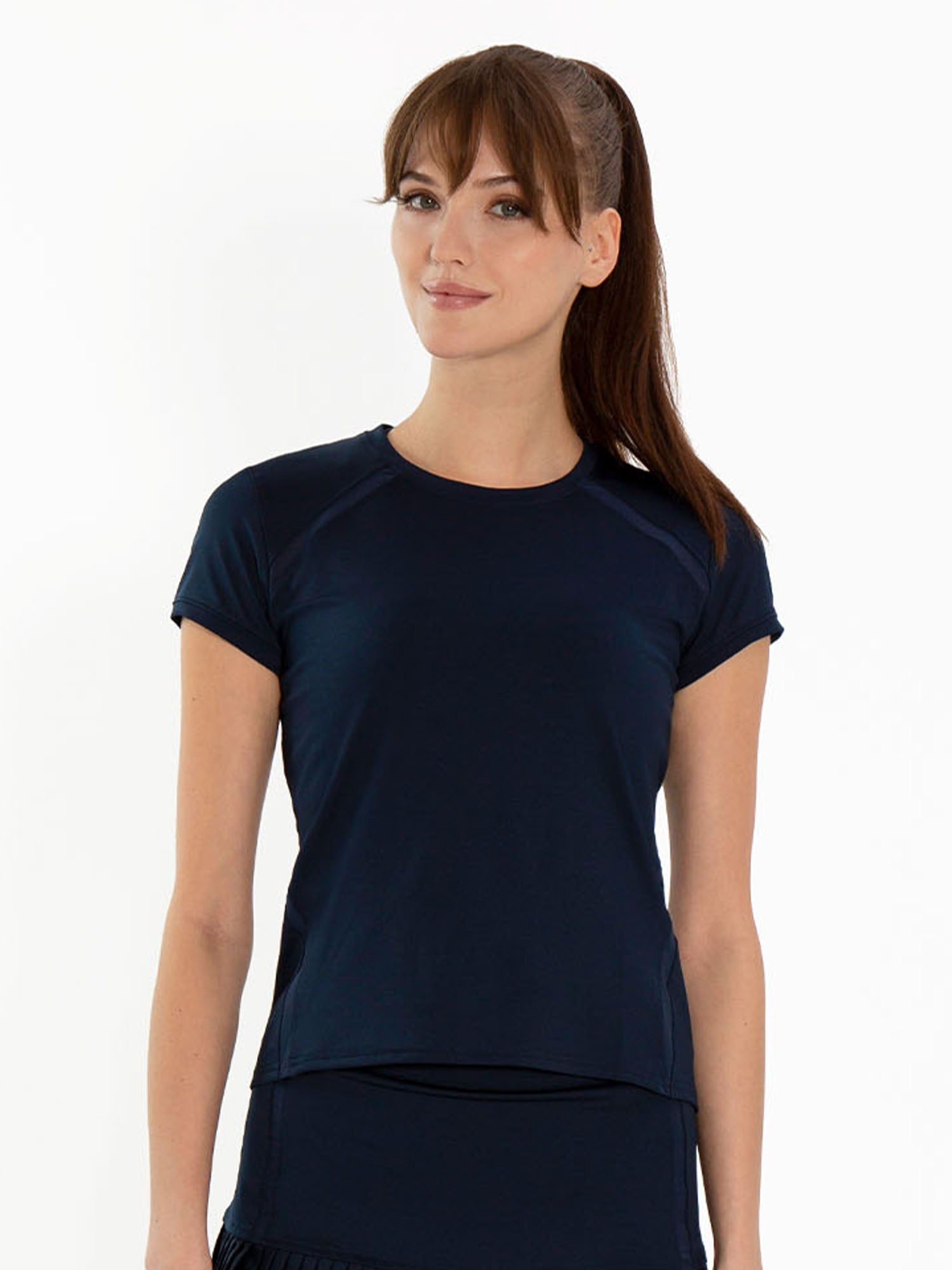 Front view of model wearing the classic short sleeve crew neck in midnight by inPhorm NYC with her hands at her side