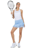 Front view of model wearing the Courtside charm tennis skirt  in bluebell by inPhorm NYC holding a tennis racket