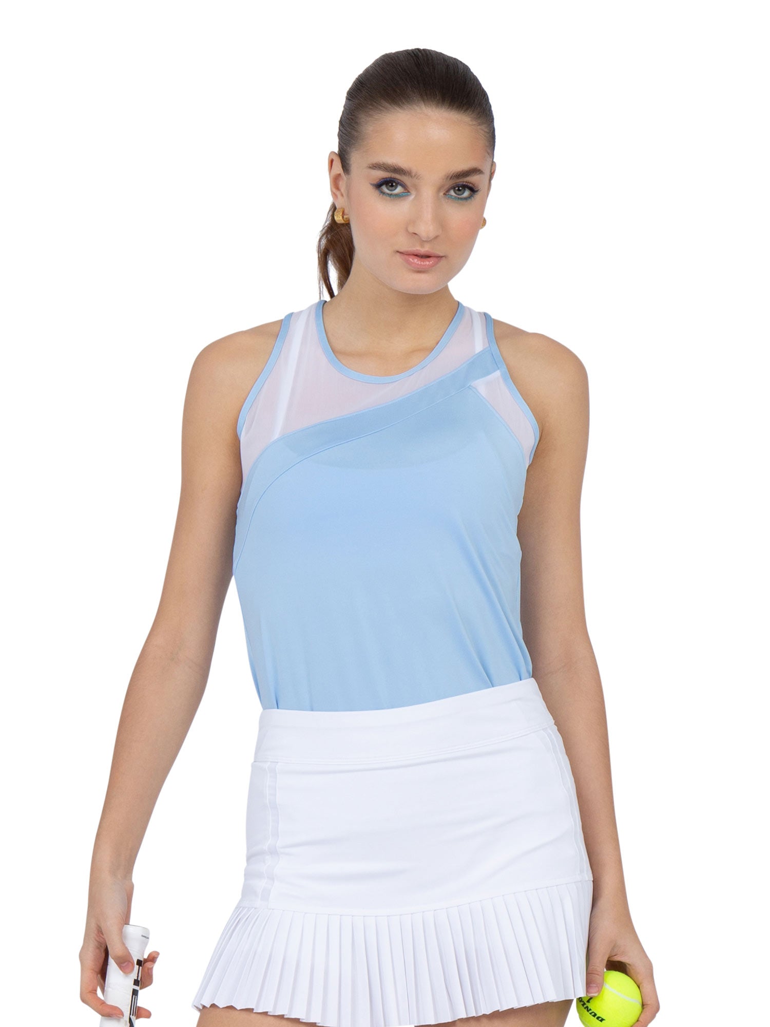 Front view of model wearing the Emma tank in bluebell by inPhorm NYC with her hands at her side holding a tennis ball and a tennis racket