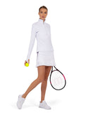 Front view of model wearing the Sinclaire 13 1/2" pleated hem golf and tennis skirt in white/imperial by inPhorm NYC holding a tennis racket and a yellow tennis ball