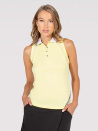 Front view of model wearing the Lilian polo tank in zest by inPhorm NYC with her hands at her side