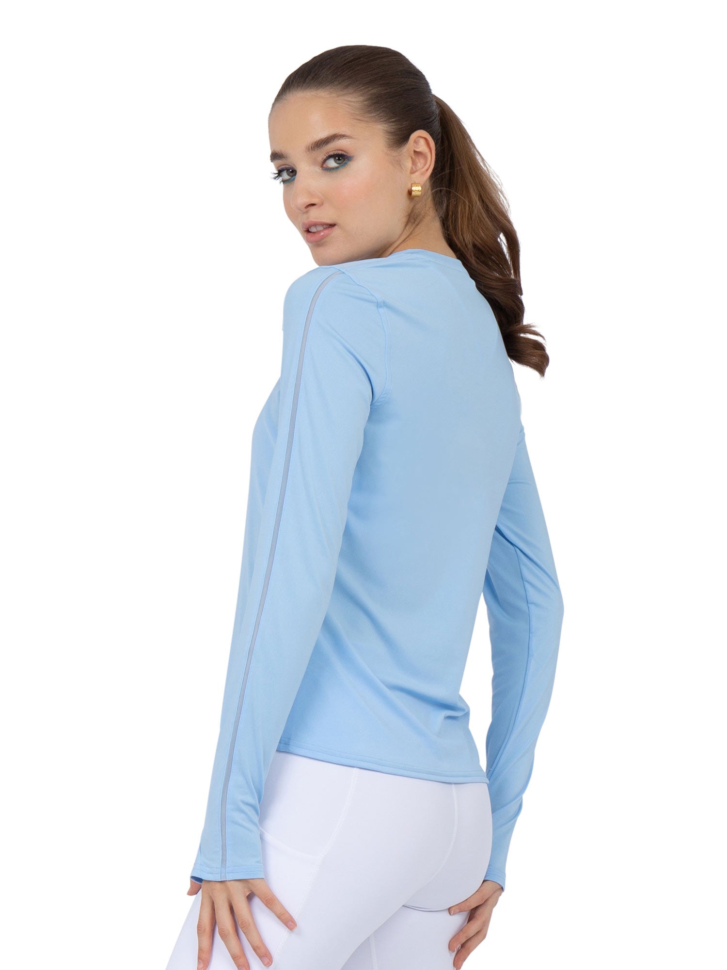 Back view of model wearing the Classic long sleeve crew neck in bluebell by inPhorm NYC with her hands at her side