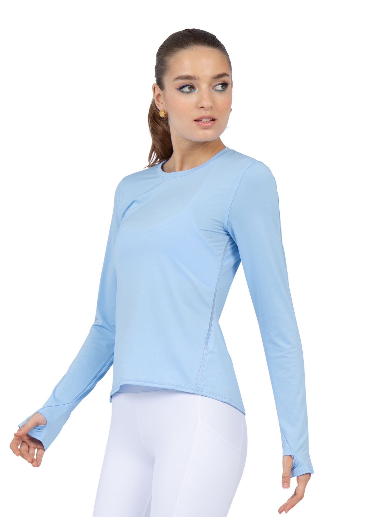 Front view of model wearing the Classic long sleeve crew neck in bluebell by inPhorm NYC with her hands at her side