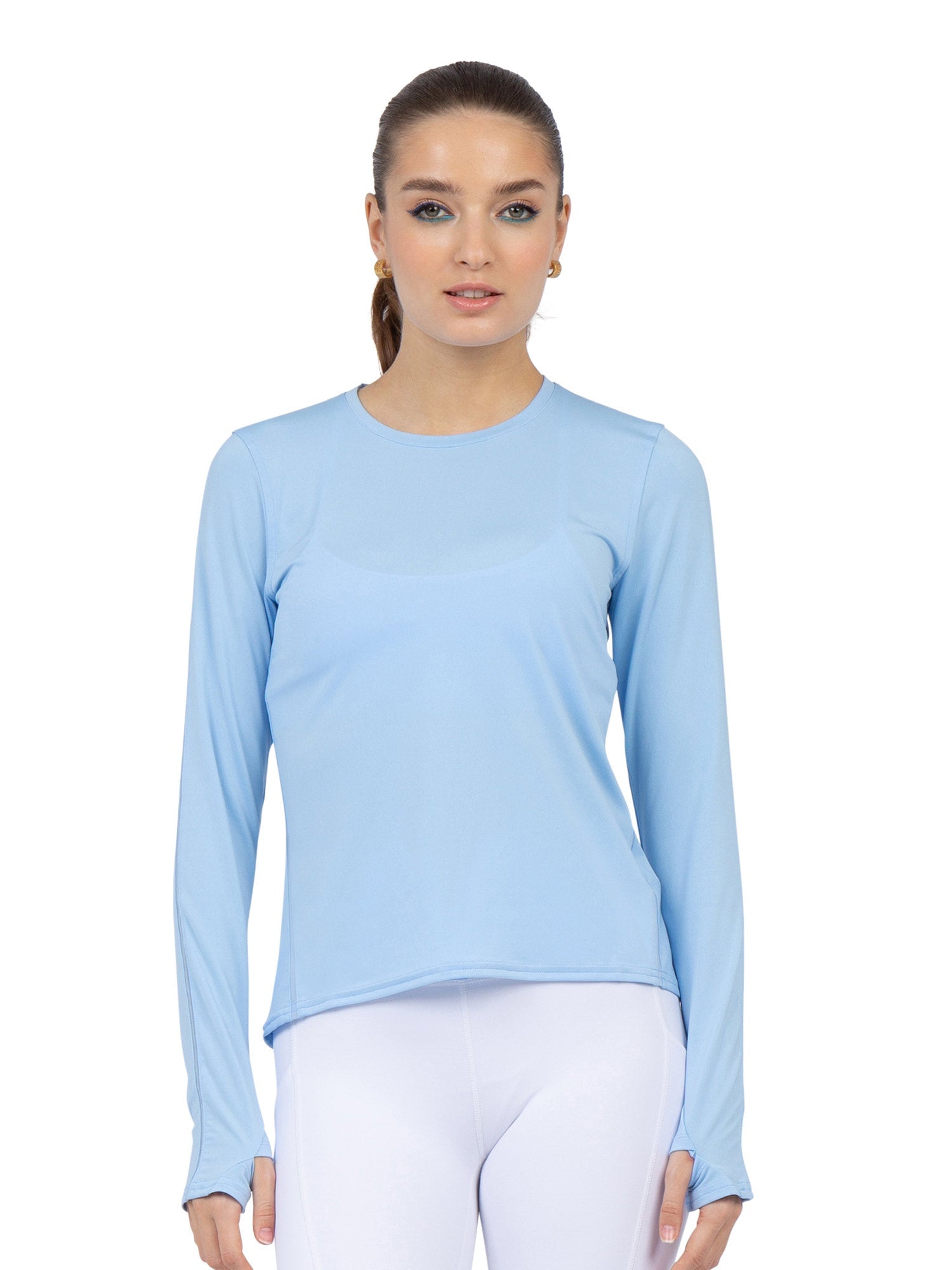 Front view of model wearing the Classic long sleeve crew neck in bluebell by inPhorm NYC with her hands at her side