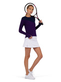 Front view of model wearing the Parker Long Sleeve Crew Neck Top in Imperial and Ink holding a tennis racket