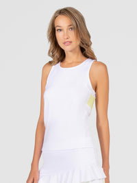 Front view of model wearing the Phoebe tennis and active tank in white and zest by inPhorm NYC with her arms at her side