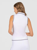 Back view of model wearing the Pheobe sleeveless polo in white and black by inPhorm NYC