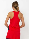 Back view of model wearing the Riley active tank in poppy and midnight by inPhorm NYC with her hands in her pockets